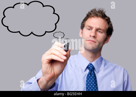 Geschäftsmann zeichnen eine Gedankenblase Stockfoto