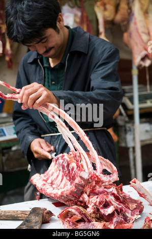 Uighur-Metzger in Kashgar, China. Stockfoto