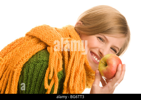 Ziemlich herbstlich Teenager-Mädchen hält Apple Lachen isoliert auf weißem Hintergrund Stockfoto