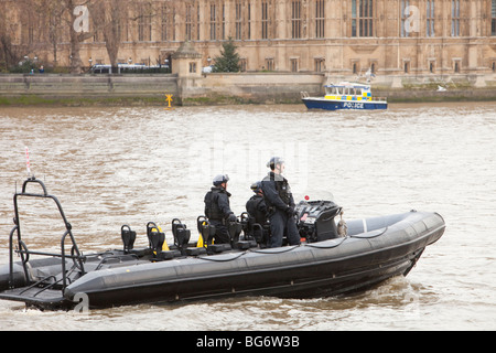 Polizeiboot Parlament schützt eine Klima-Änderung-März in London Stockfoto