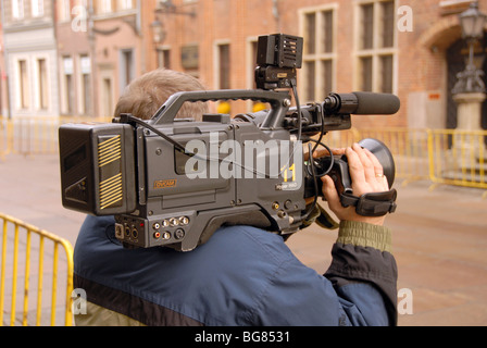 Fotografierten News Kameramann bei lokalen Stadt event Stockfoto