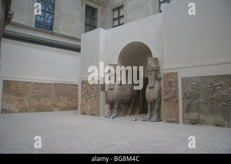 Assyrischen Kunst. "Lamassu" oder Stier-Mann. Tor von Sargon II Palast. Stockfoto