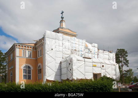 Wiederherstellung der alten historischen Holzkirche in Rautalampi, Finnland Stockfoto