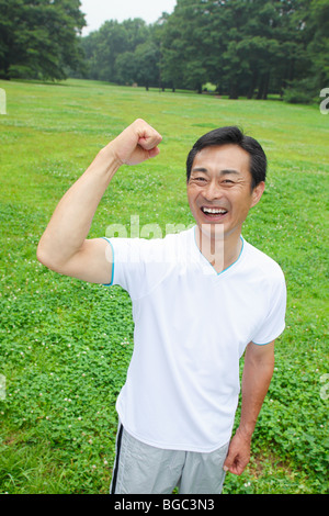 Reifer Mann Muskeln Stockfoto