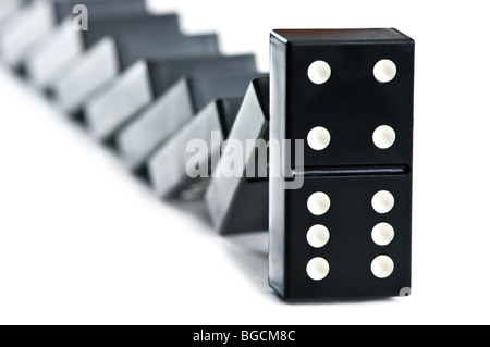schwarze Domino fallen Stockfoto