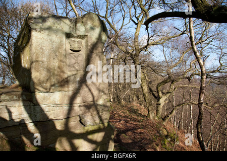 Geschnitzten Stein auf Stanton Moor zwischen Birchover und Rowsley in Derbyshire Peak District, Großbritannien Stockfoto