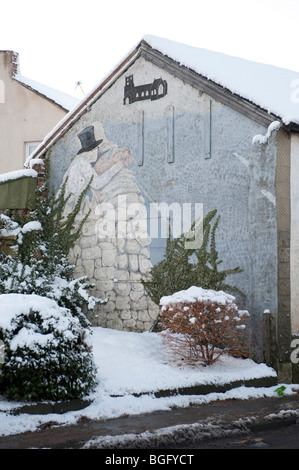 ' T ' Mann wi' t' Schwein auf t 'Wand'; Der Mann mit dem Schwein auf der Wand Wandbild, Kippax, Leeds Stockfoto