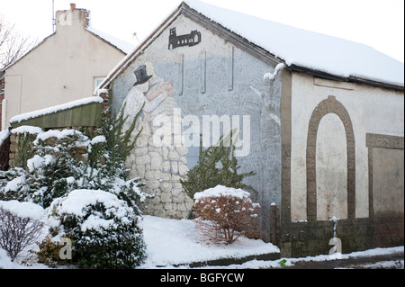 ' T ' Mann wi' t' Schwein auf t 'Wand'; Der Mann mit dem Schwein auf der Wand Wandbild, Kippax, Leeds Stockfoto