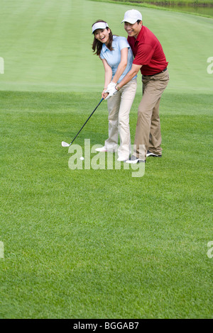 Golf-Trainer unterrichten, Golf spielen Stockfoto