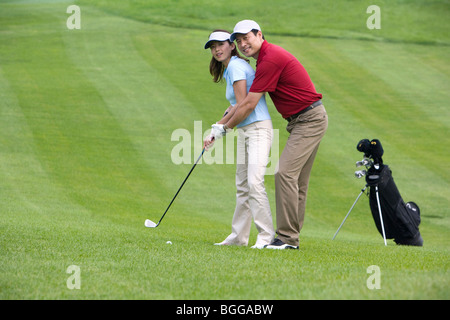 Golf-Trainer unterrichten, Golf spielen Stockfoto