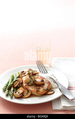 Schweinekoteletts marsala Stockfoto