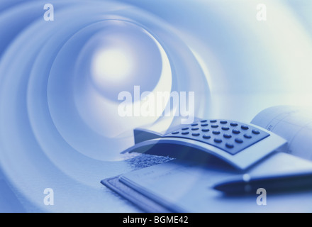 Business Essentials ein Taschenrechner und Tagebuch - digital Composite Stockfoto