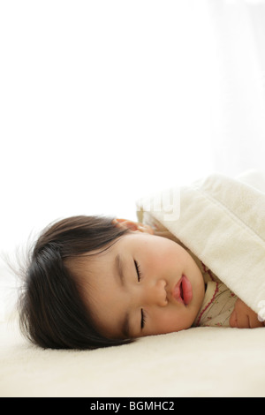 Baby ein Nickerchen Stockfoto