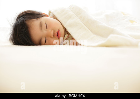 Baby ein Nickerchen Stockfoto