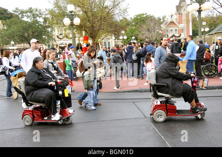 Handicap-Elektro-Scooter aka Electric Komfort Fahrzeug (ECV), Disneyworld, Orlando, Florida, USA Stockfoto