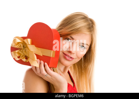 Junge Frau mit Herz Geschenk Stockfoto