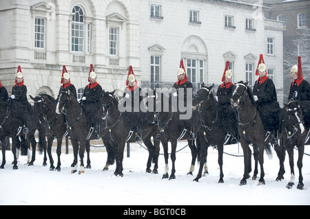 Der Königin Leibgarde zu Pferde im Schnee, London, England Stockfoto