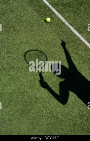 Schatten, die Tennis spielen Stockfoto