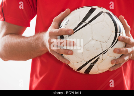 Fußballspieler und-Trainer Stockfoto