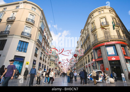 Calle Marques de Larios mit Weihnachten Dekorationen, Malaga, Costa Del Sol, Spanien. Stockfoto