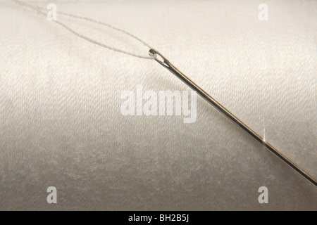 Nadel und Faden Stockfoto