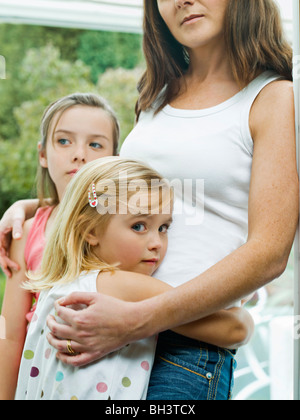 Ein Porträt einer Mutter und ihre Töchter Stockfoto