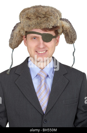 Lachen, einäugigen Mann in eine Pelzmütze, isoliert auf weißem Hintergrund Stockfoto