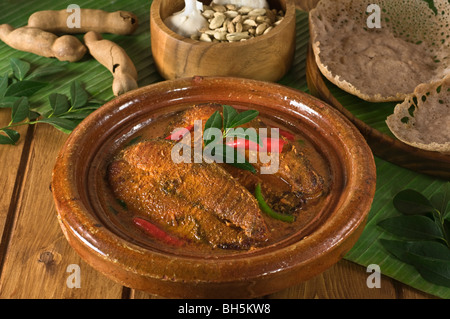 Kerala Fisch curry mit Appams Südindien Essen Stockfoto