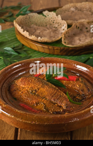 Kerala Fisch curry mit Appams Südindien Essen Stockfoto