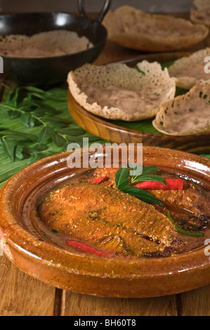 Kerala Fisch curry mit Appams Südindien Essen Stockfoto