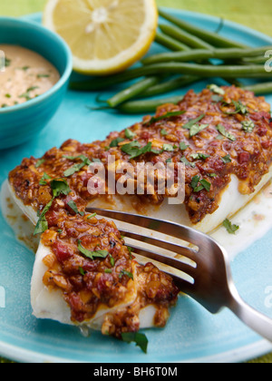 Schellfisch Romanesco mit grünen Bohnen Stockfoto