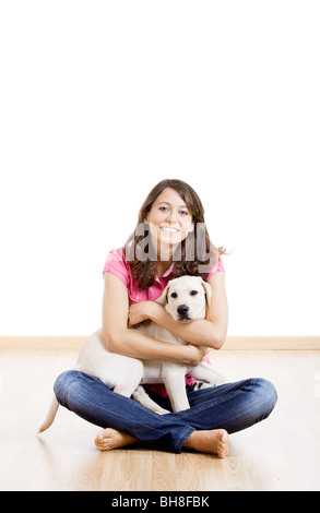 Junge Frau mit einer schönen und niedlichen Hund Stockfoto