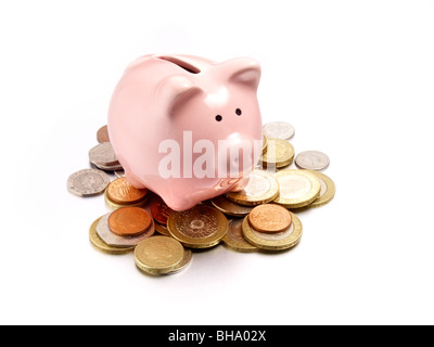 Sparschwein auf Münzen des Pfund sterling Stockfoto