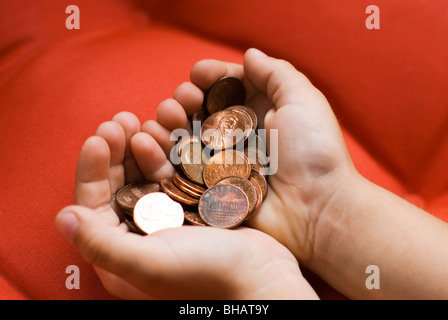 Handvoll Münzen Stockfoto