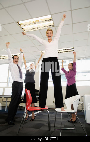 Business Team feiert Stockfoto