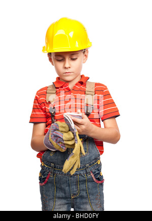 Porträt eines niedlichen Kind Schutzhandschuhe anziehen Stockfoto