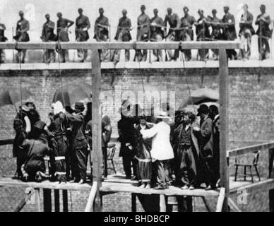 Geografie/Reisen, USA, amerikanischer Bürgerkrieg 1861 - 1865, Mord an Präsident Abraham Lincoln, Hinrichtung der Verschwörer Mary Surratt, Lewis Powell, David Herold und George Atzerodt, Old Arsenal Penitentiary, Washington DC, 7.7.1865, Militärjustiz, Kriegsrecht, Galgen, hängen, 19. Jahrhundert, historisch, historisch, Menschen, Stockfoto