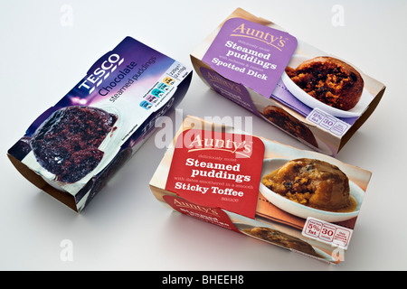 Drei Box Packungen mit zwei einzelnen gedämpfte Schwamm Pudding Stockfoto