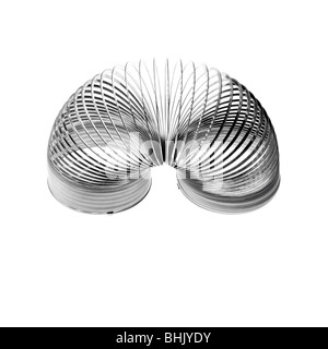 Slinky Chrom auf weißem Hintergrund Stockfoto