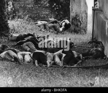 Geographie/Reisen, Kongo, Ereignisse, Simba-Aufstand 1964 - 1965, Einnahme von Stanleyville durch Regierungstruppen, tote Rebellen in einem Garten, 4.12.1964, Stockfoto