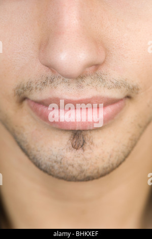 Close up Portrait of a young Man es Mund und Nase Stockfoto