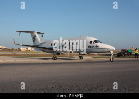 Medavia Beech 1900D Turboprop commuter Flugzeug auf dem internationalen Flughafen in Malta Stockfoto