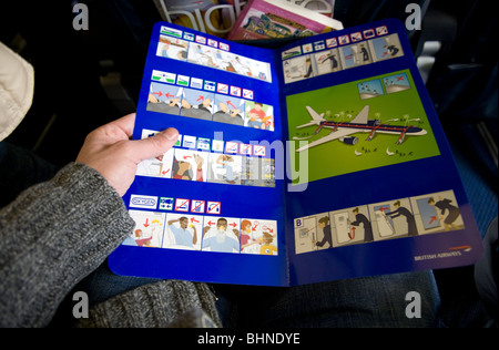 An Bord von Flug-Safety-card Stockfoto