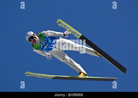 Michael Uhrmann (GER) im Wettbewerb jedenfalls Skisprung-Team bei den Olympischen Winterspiele 2010, Vancouver, Britisch-Kolumbien. Stockfoto