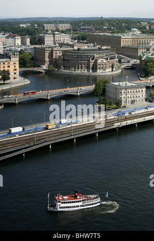 Helgeandsholmen & Riksdagshuset / Reichstag Gebäude von Stadthaus / Rathaus, Stockholm, Schweden Stockfoto