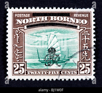 Briefmarke von Nord-Borneo (später Teil von Malaysia) Darstellung einer Proa. Stockfoto