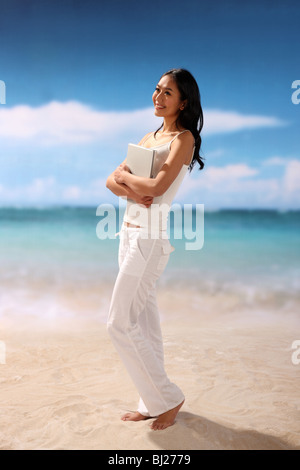 Frau am Strand Stockfoto