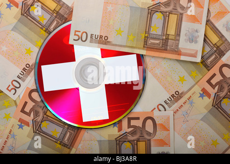 DVD, CD, Euro-Scheine, Nationalflagge Schweiz, symbolisches Bild für den Kauf von Bankunterlagen, Steuerhinterziehung, Banking confid Stockfoto