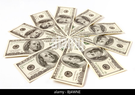 Künstlerische Muster hergestellt aus Dollarnoten Schneeflocke oder Sterne isoliert auf weißem Hintergrund Stockfoto
