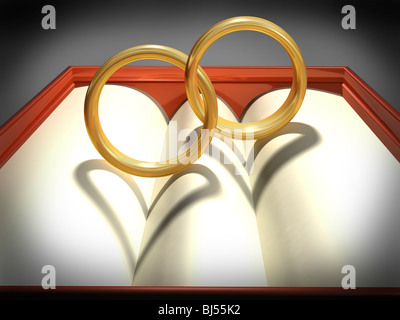 Zwei ineinandergreifende Trauringe mit Herz Schatten Stockfoto